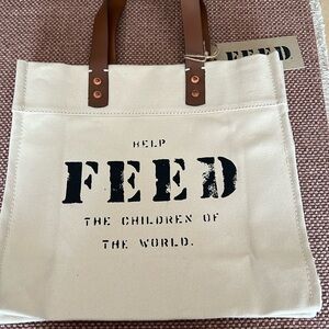 Small FEED Market tote. Sturdy with tag.